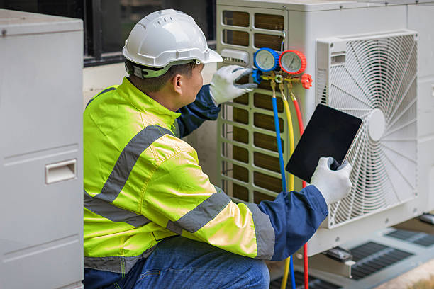 Professional Emergency Ac Repair technician working in Lake Hill, NY